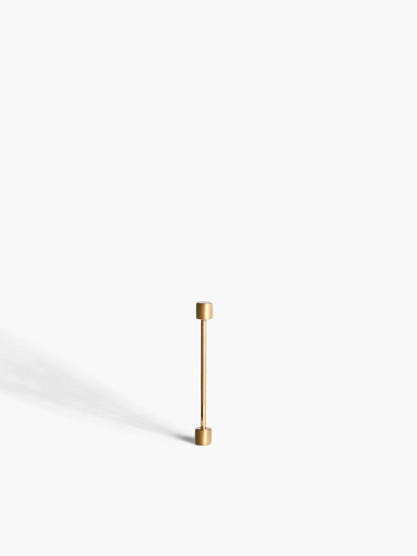 Gold earring on a white background
