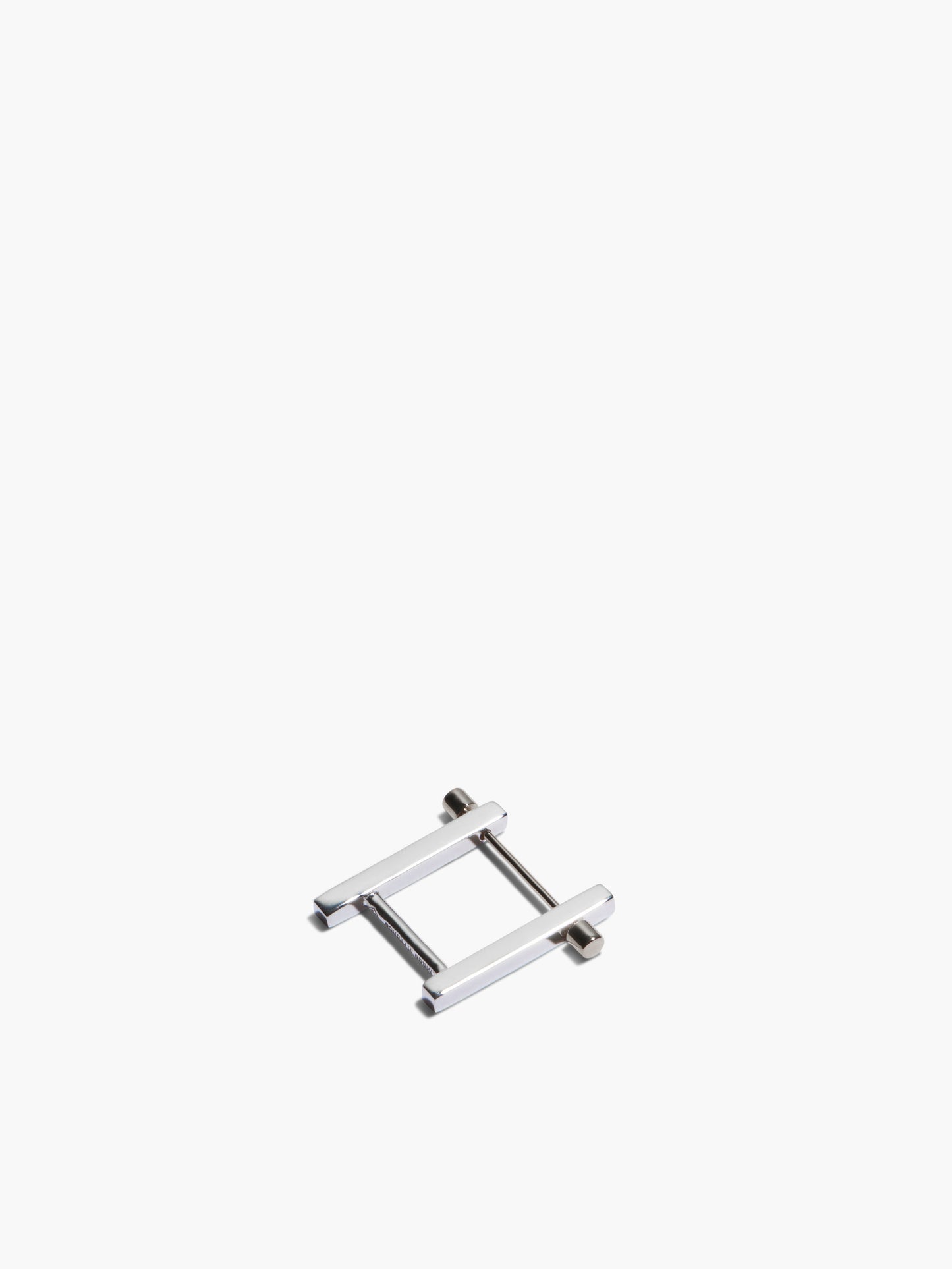 Small metal bracket earrings on a white background