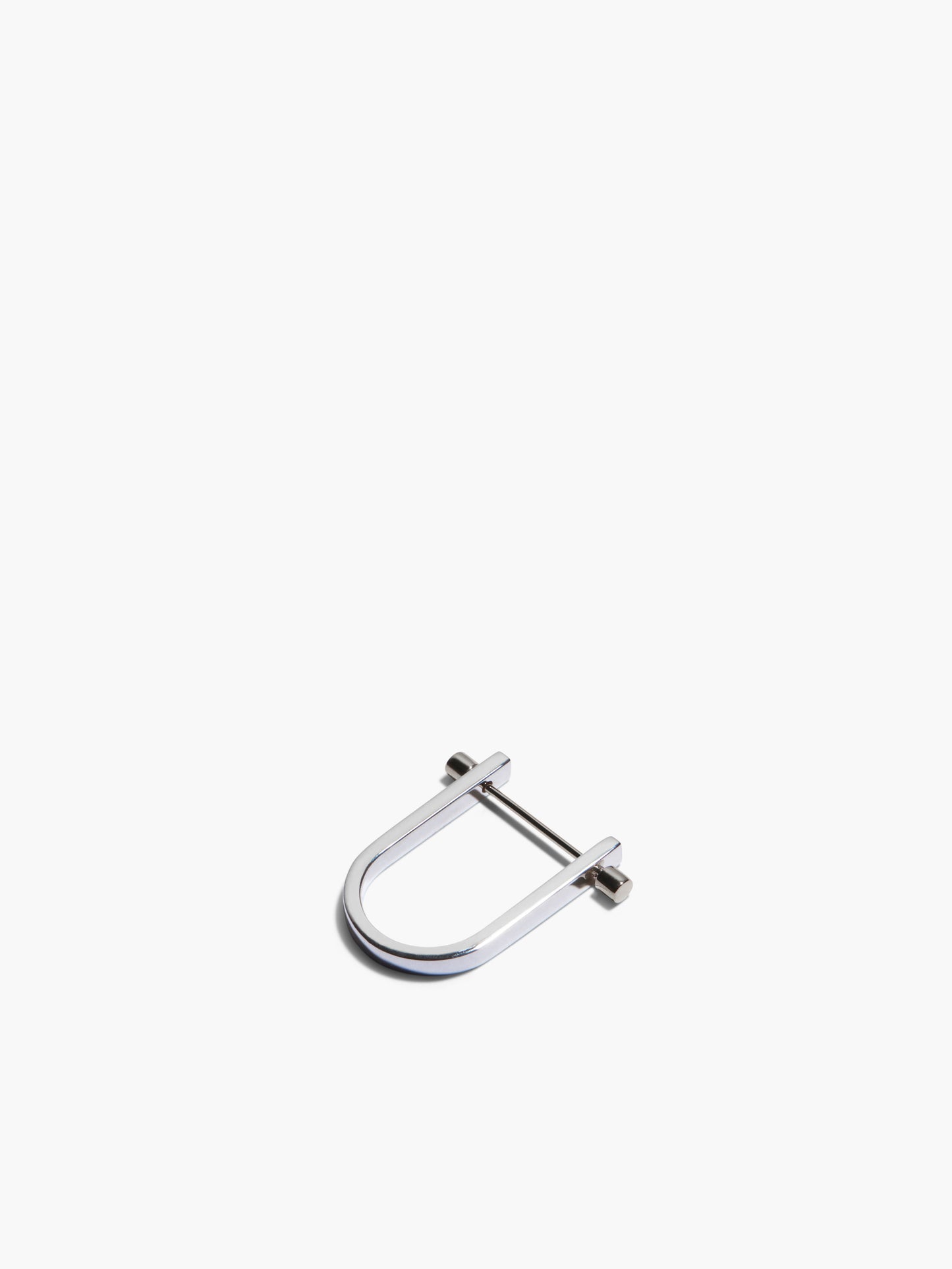 Metal U-shaped clip earrings on a white background