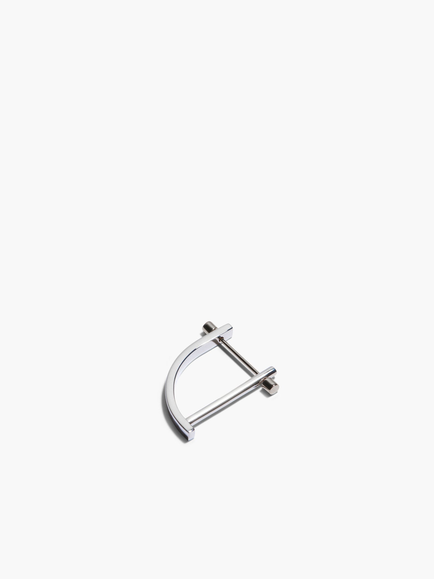 Silver earring on a white background