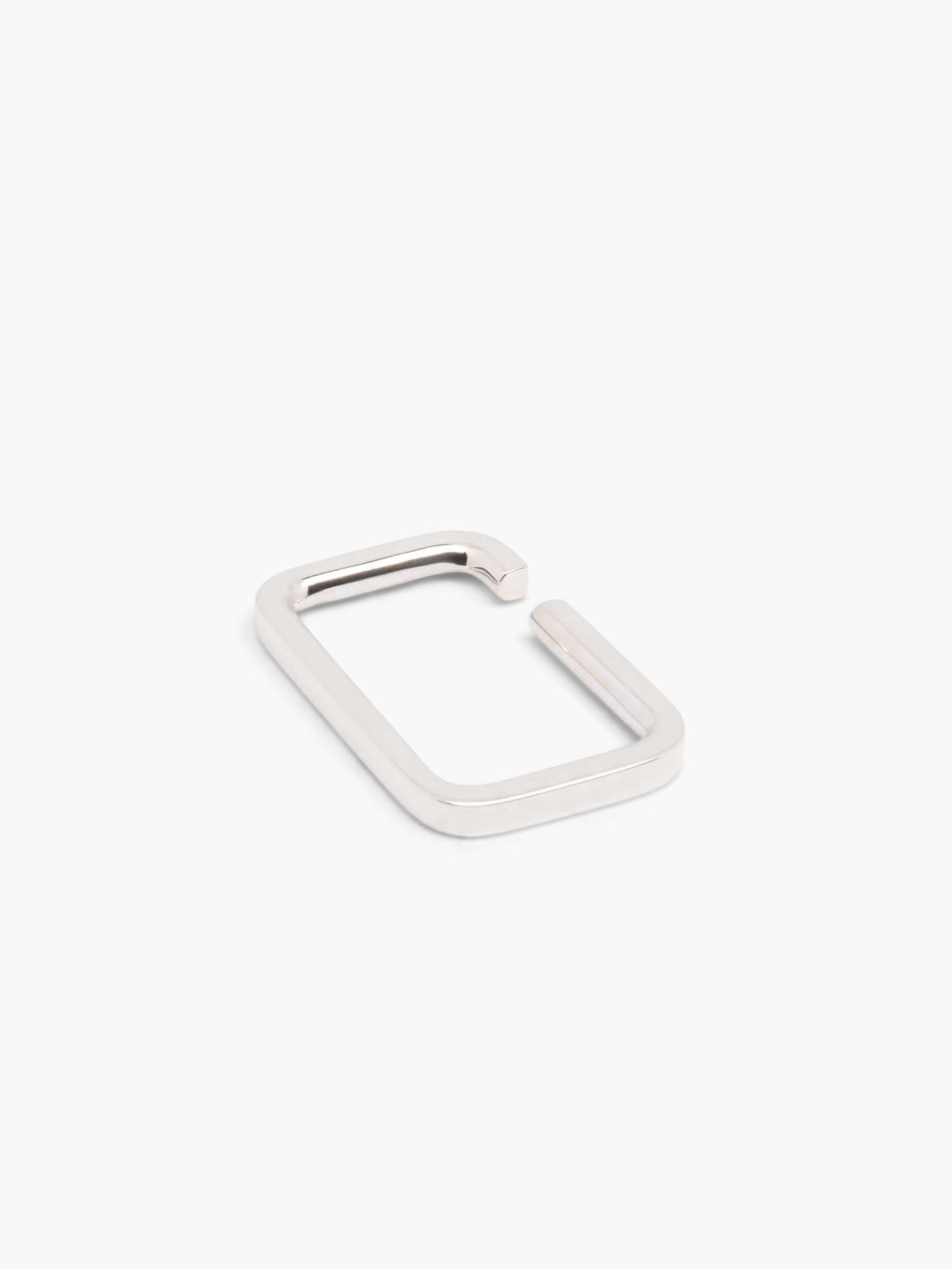 Silver earcuff on a white background