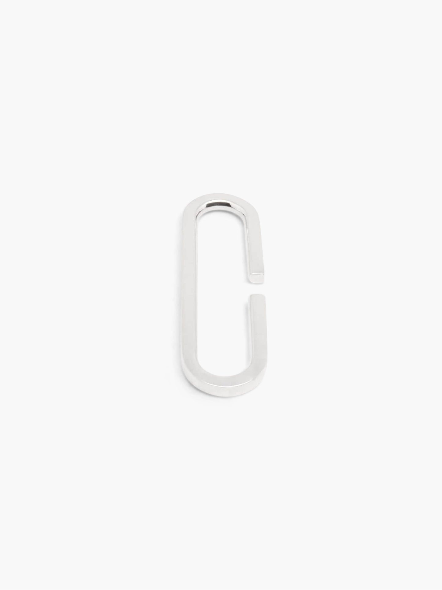 silver clip earcuff on a white background