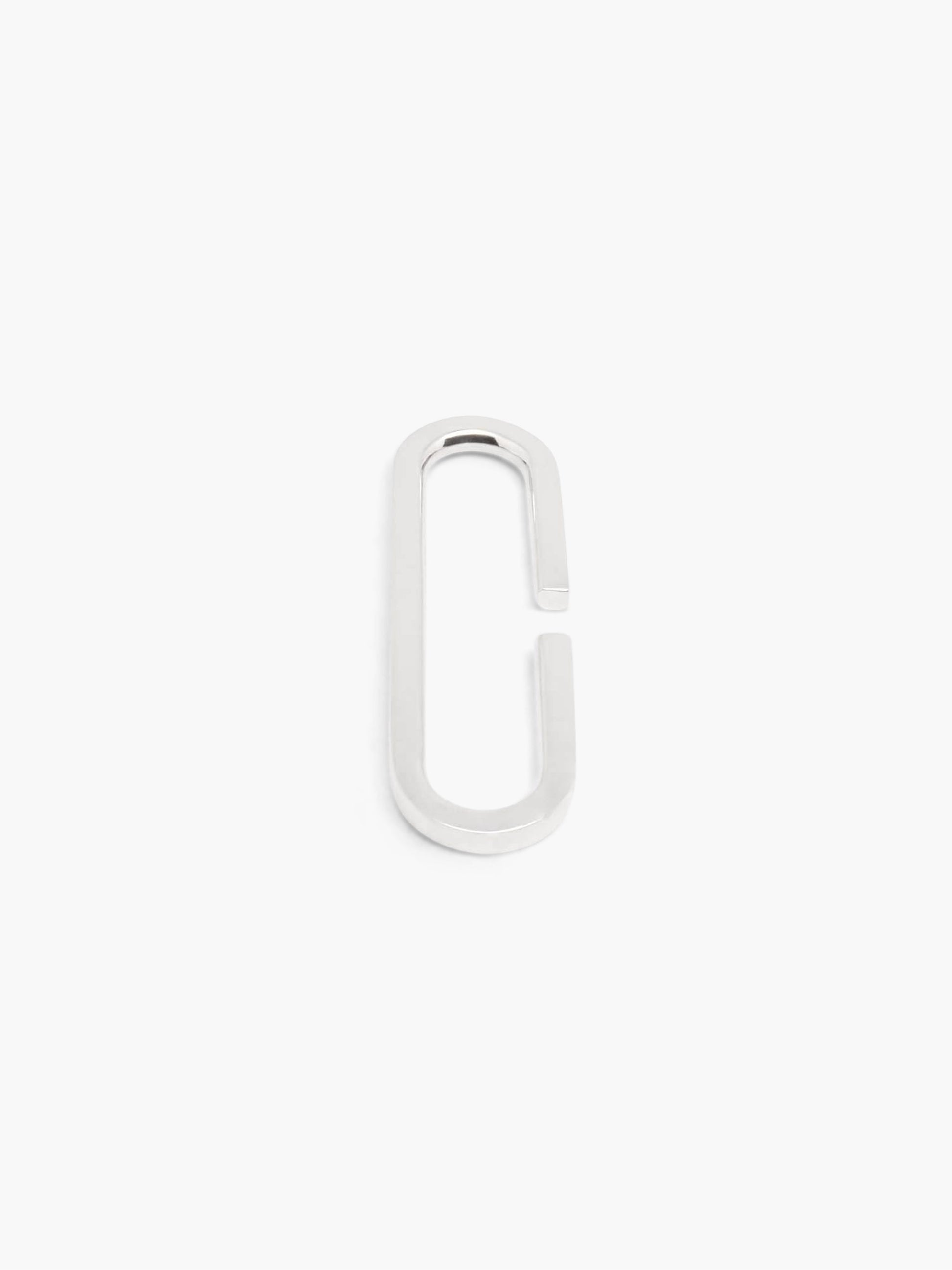 silver clip earcuff on a white background