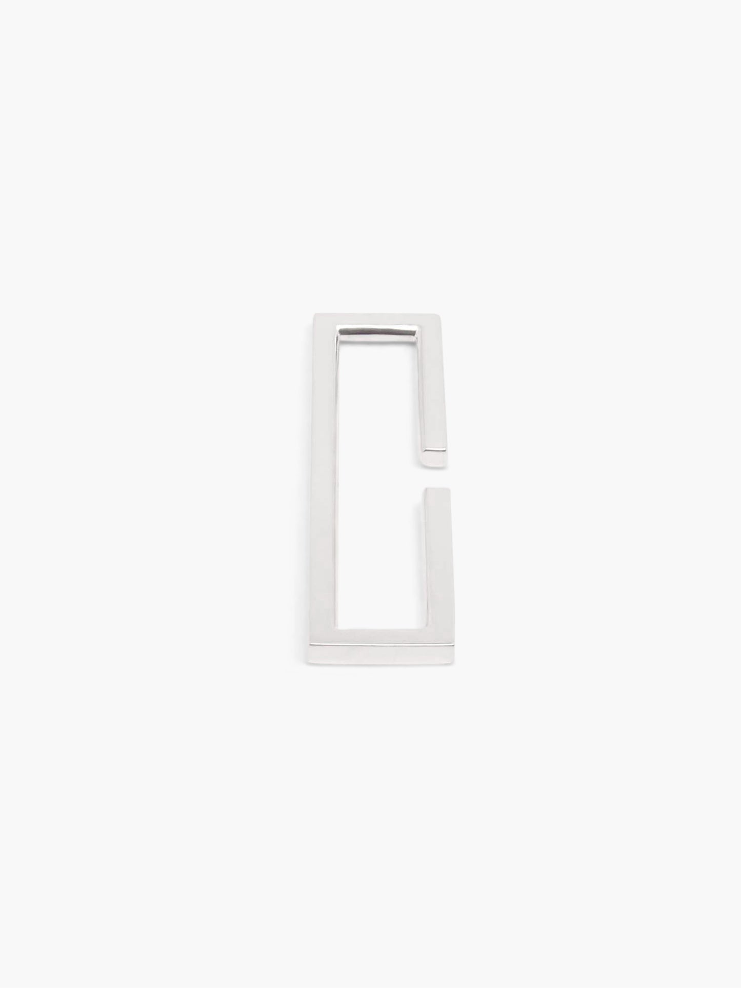 silver rectangular frame earcuff on a white background