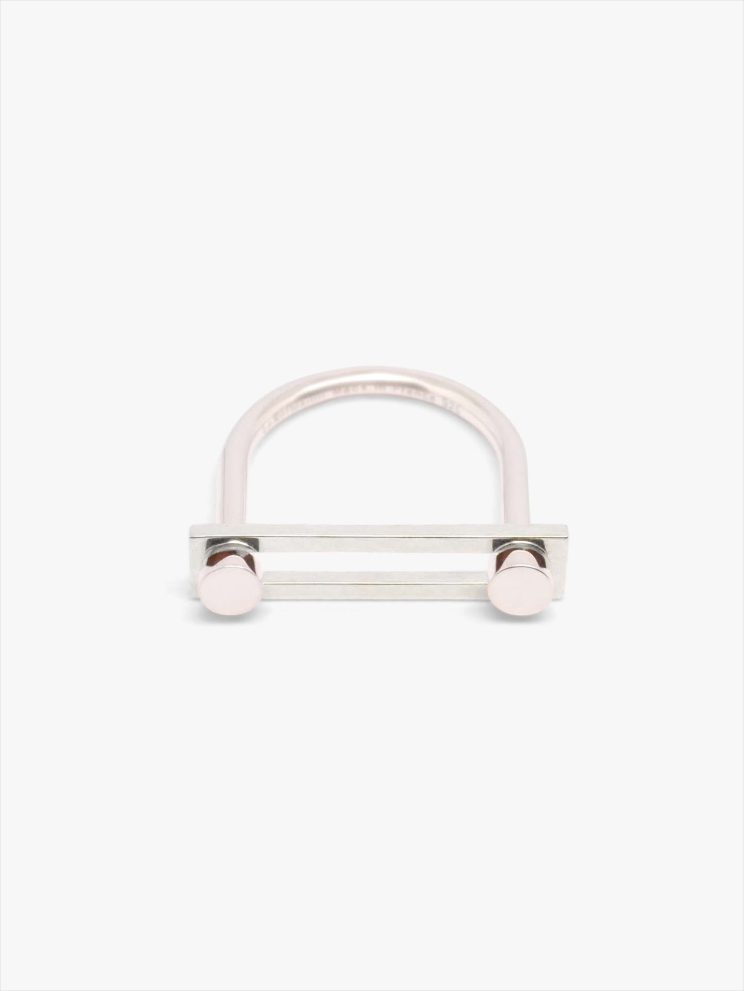 Silver ring with a round bar on a white background