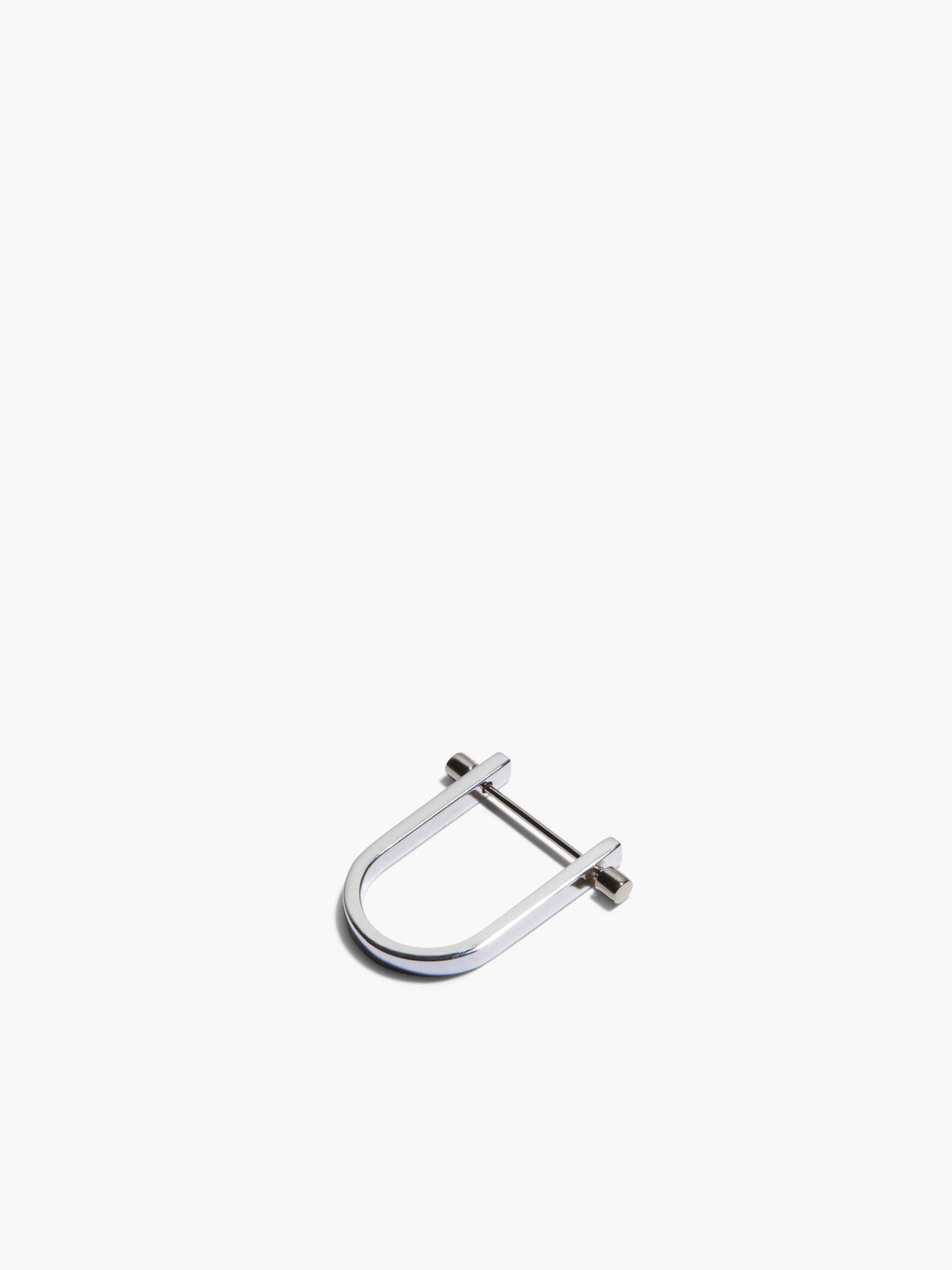 Metal U-shaped clip earrings on a white background