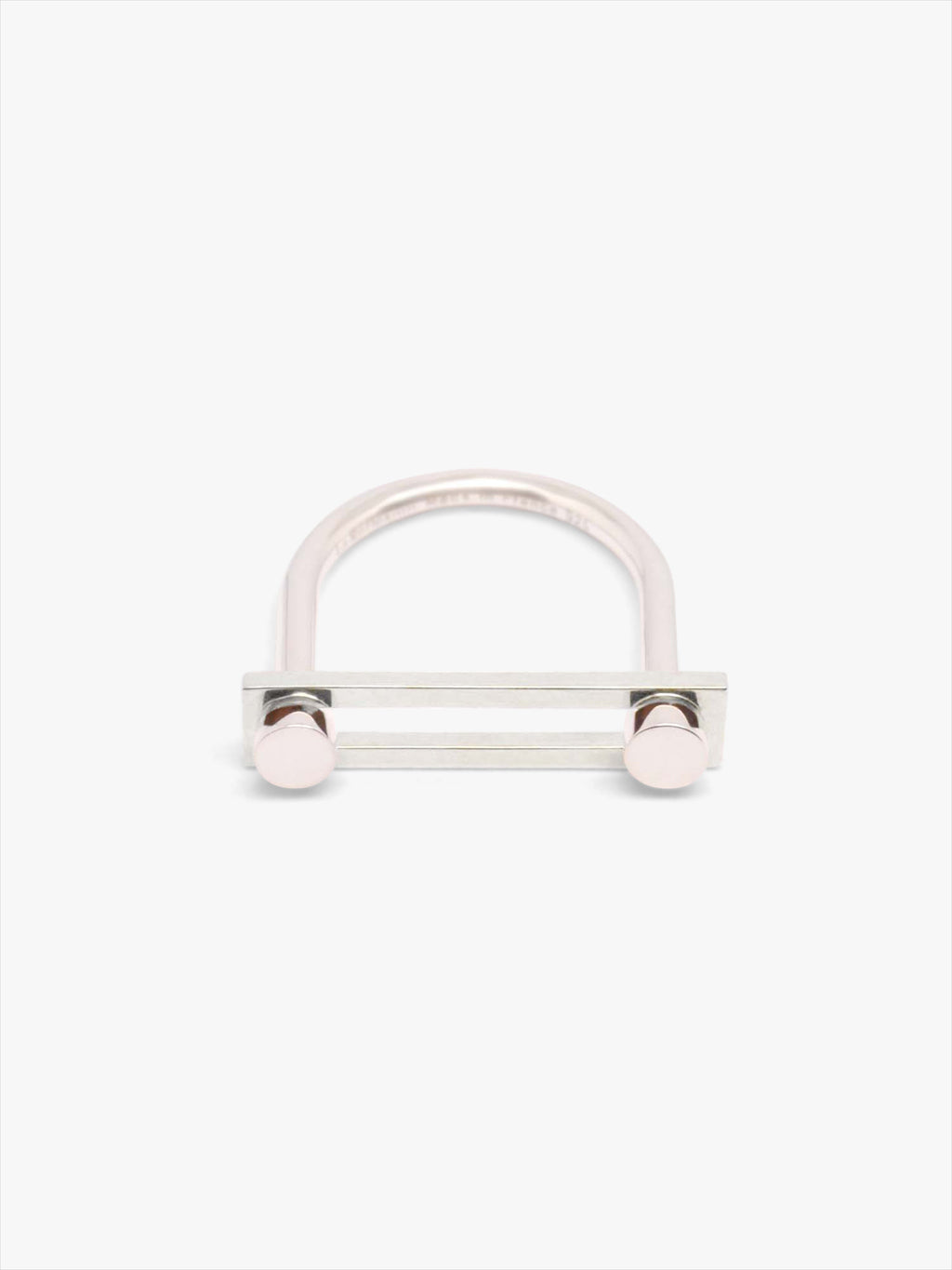 Silver ring with a round bar on a white background
